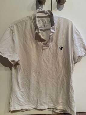 American Eagle Outfitters Men’s Off-White Polo with Navy Logo